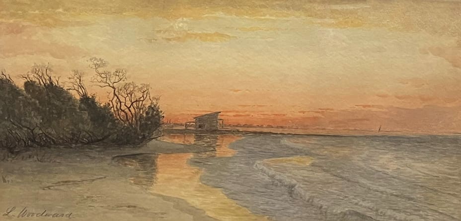 A serene beach scene at sunset, with gentle waves lapping at the shore and silhouetted trees and a structure in the distance. Warm hues fill the sky and reflect on the water.