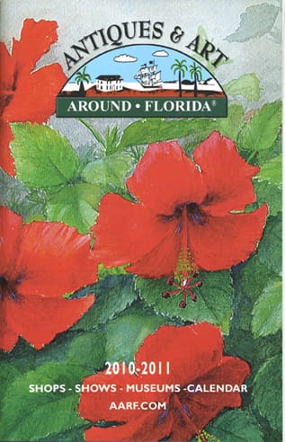 A magazine cover titled "Antiques & Art Around Florida" for 2010-2011, featuring vibrant red hibiscus flowers and information on shops, shows, museums, and a calendar.